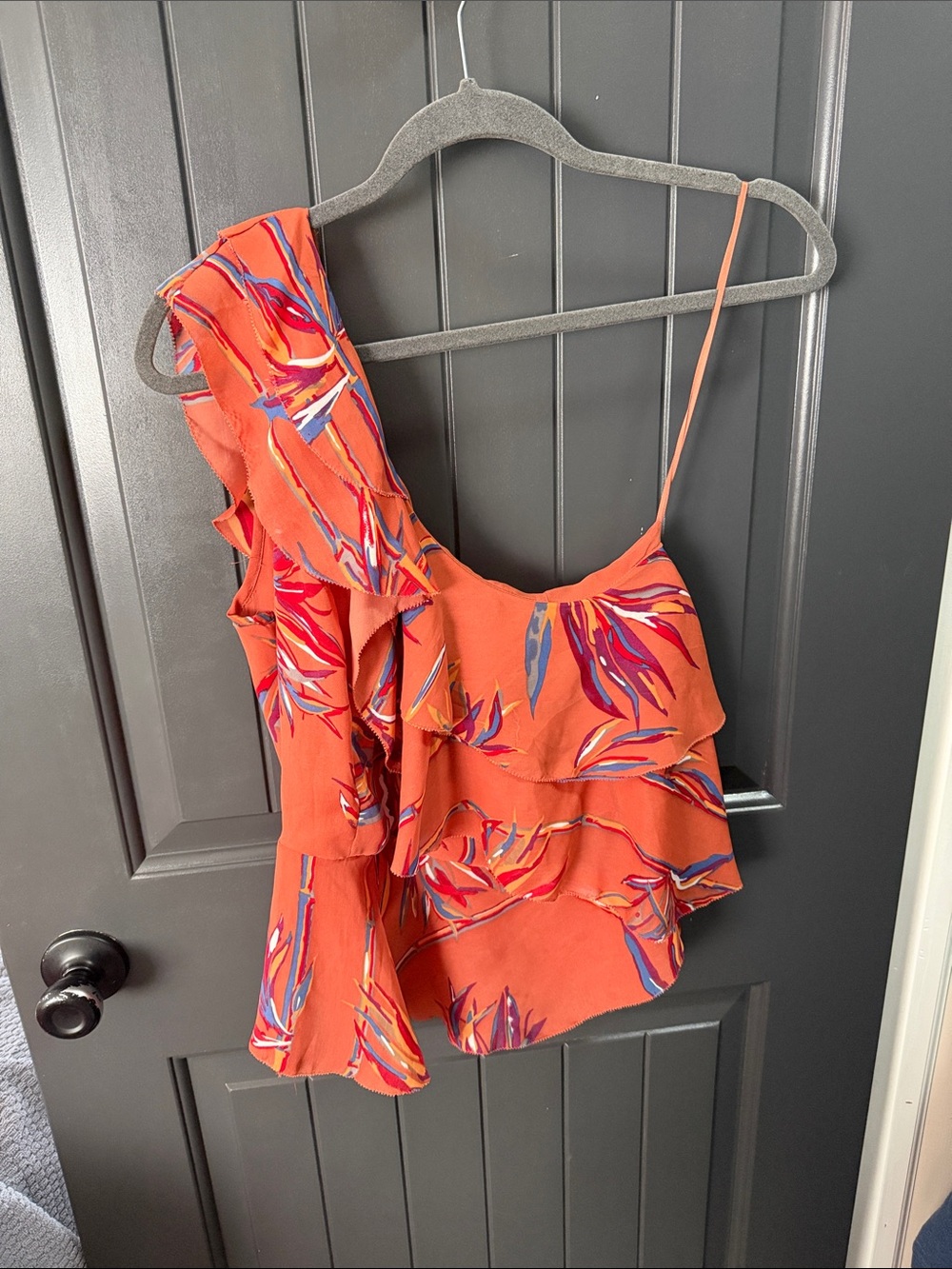 Amaryllis Orange One-Shoulder Ruffle Camisole with Multicolor Leaf Print